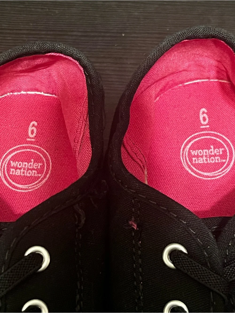 Women’s Wonder Nation black canvas sneakers with pink lining, size US 6